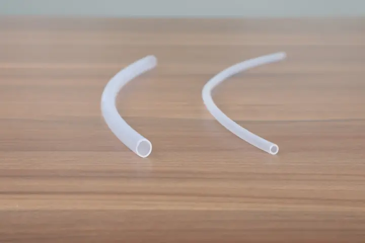 Bent PFA tubes showing their flexibility